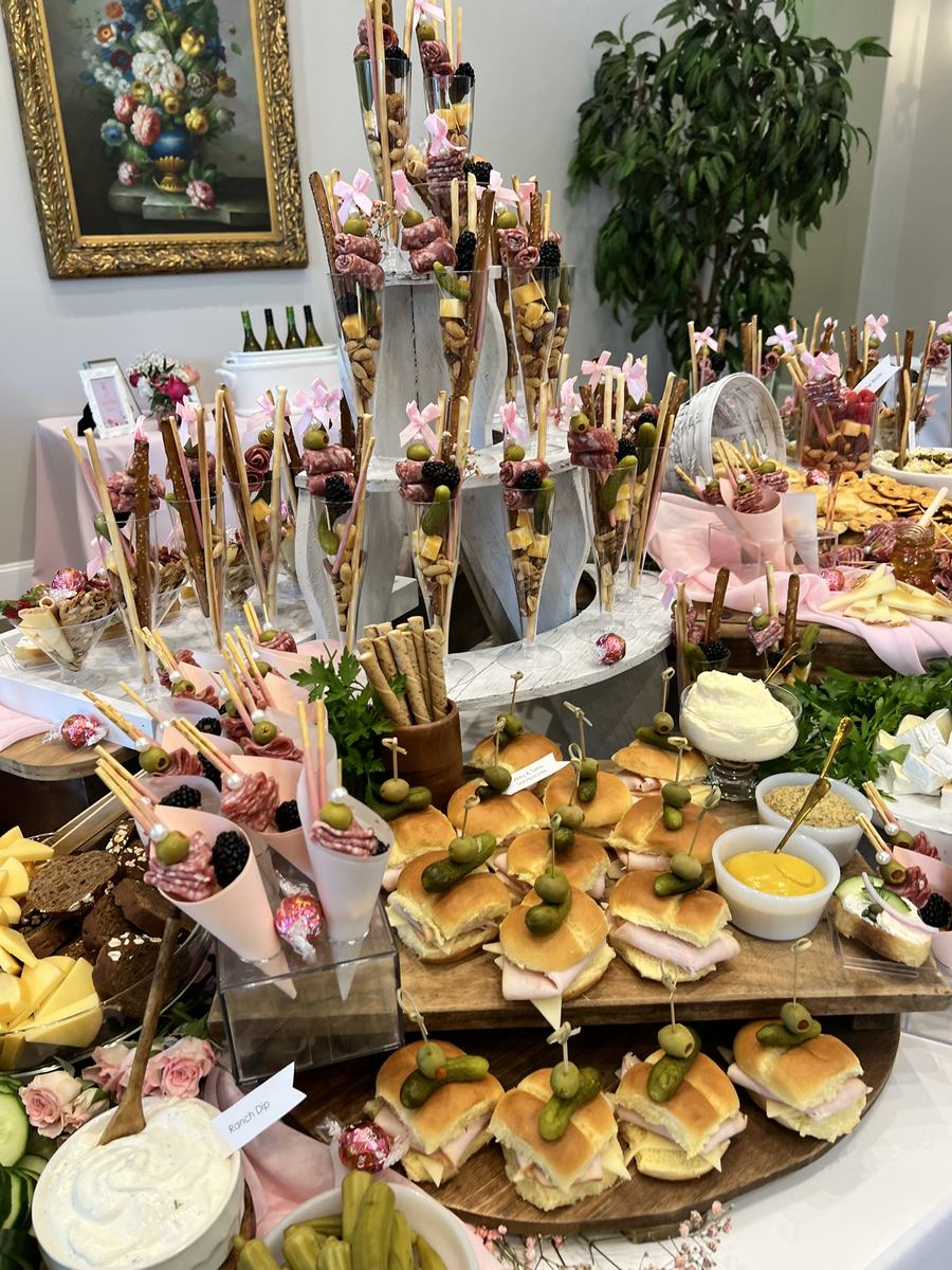 Grazing table styled in blush and gold