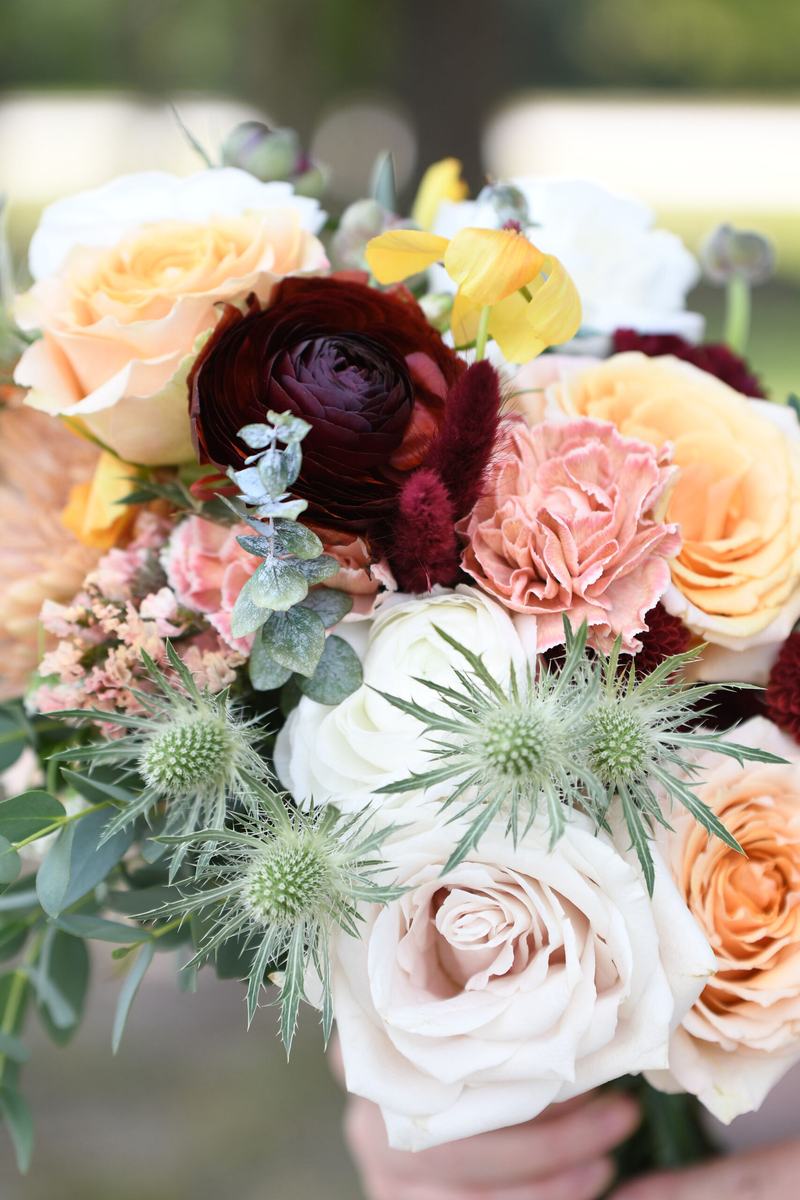 Bouquet of garden roses, ranunculus and eucalyptus
