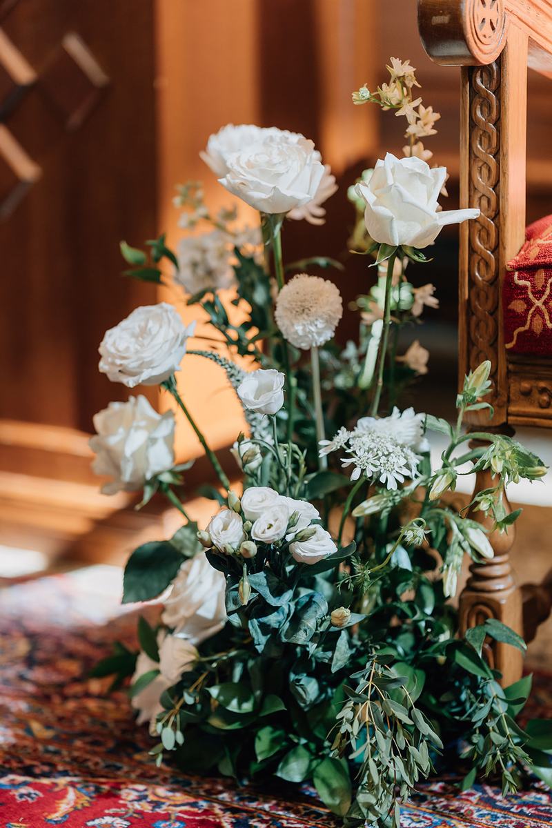 White garden rose and greenery arrangement