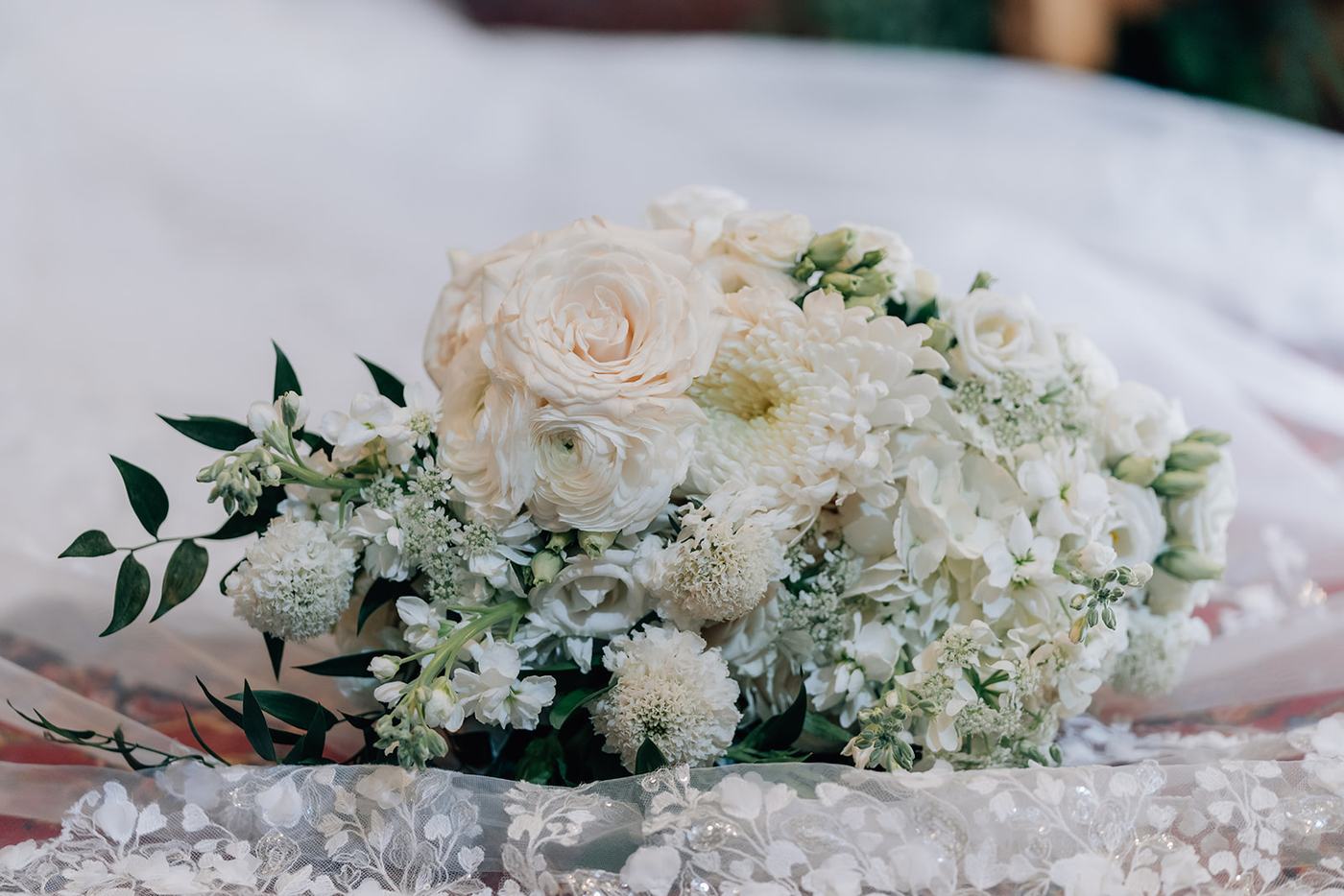 White rose and hydrangea detail on ivory linen